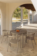 Set de table ronde Ø110 cm en aluminium Elton et 4 chaises de jardin empilables en polypropylène Ivor